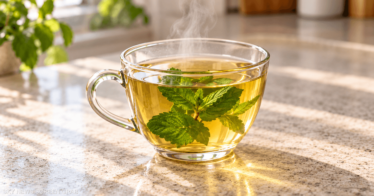 herbal tea and prune juice on table